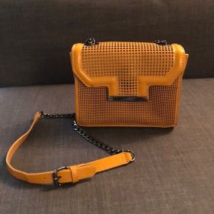 Cute Mustard yellow textured bag from Zara